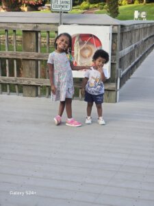 two children looking at the camera